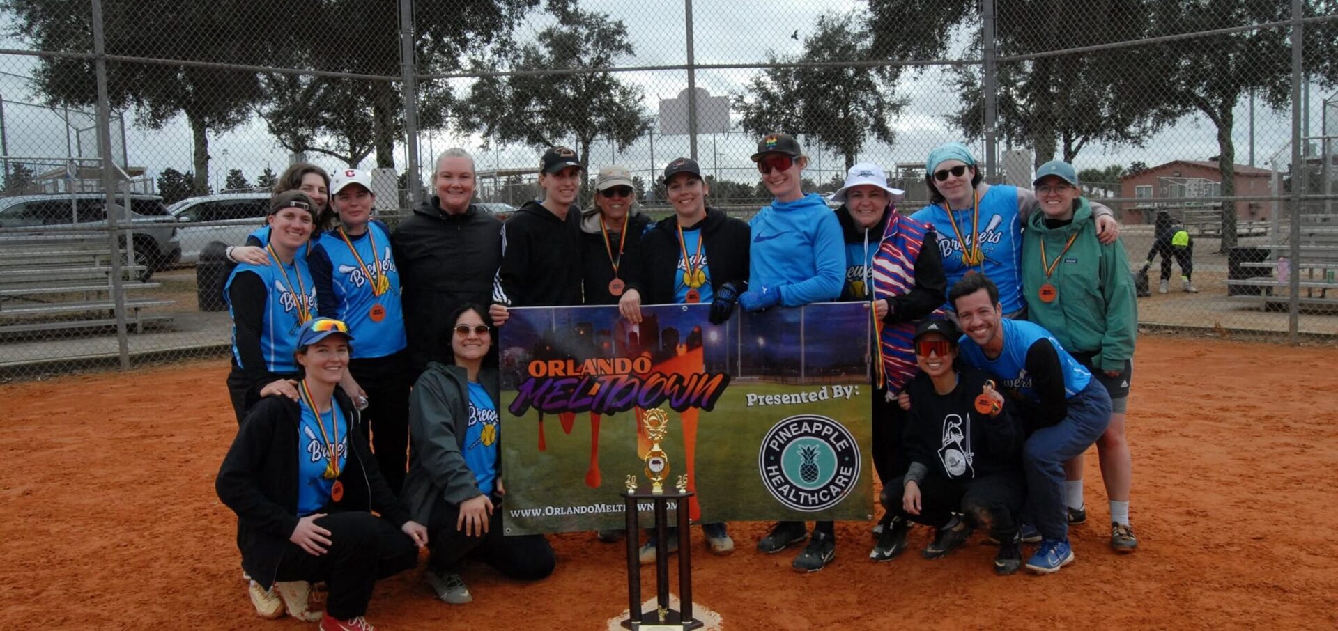 Celebratory team photo with medals