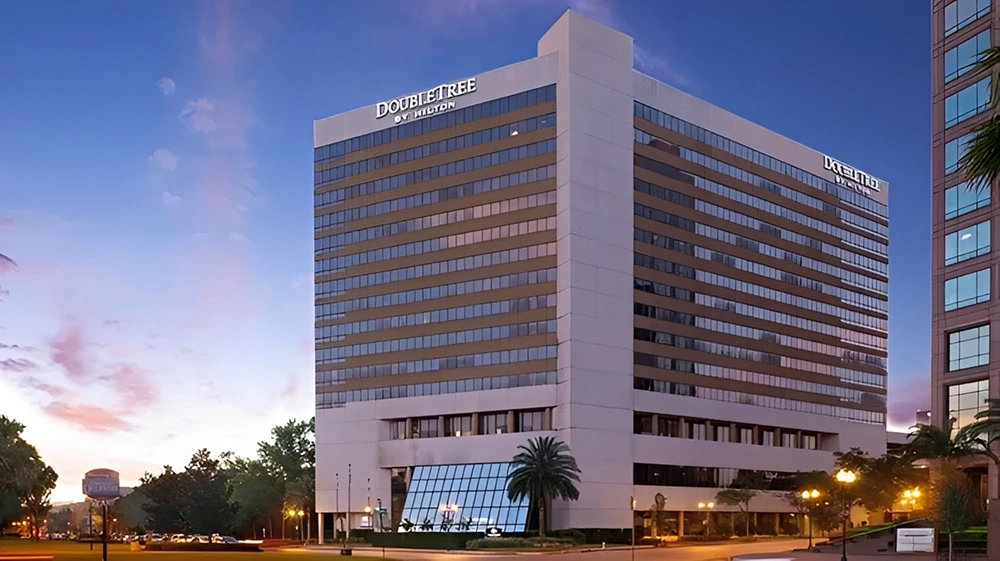 High-rise hotel with evening lights